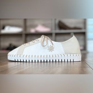 Brand new, never worn Claire Flowers sneakers